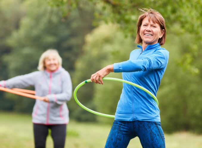 women hula hooping